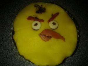 Cupcake decorated as a Yellow Angry Bird